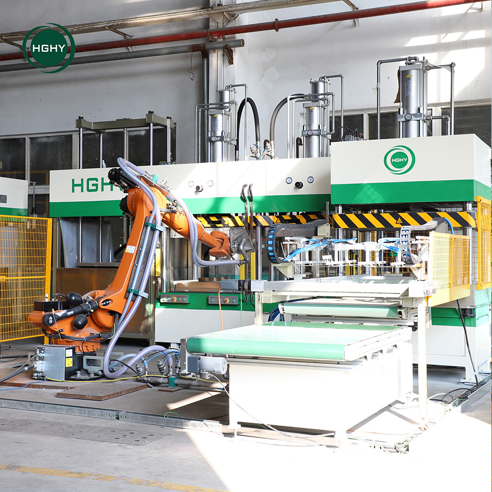 新型一次性餐具热成型机快餐盒纸浆成型机机器人纸浆成型机