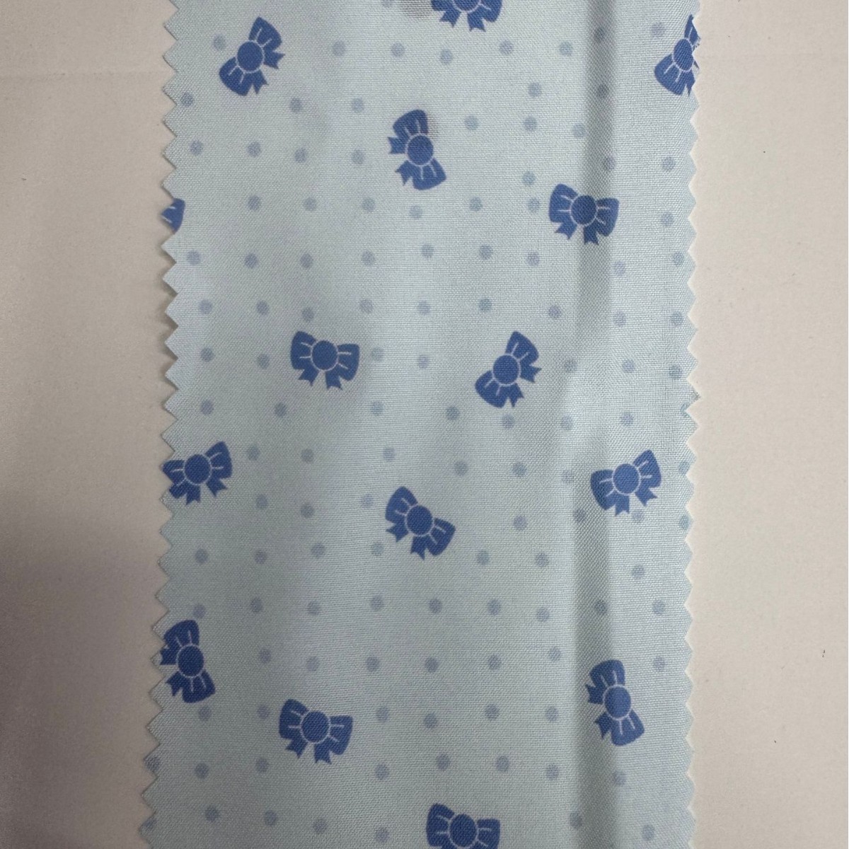 Textile cloth with bow, bag, children's clothing