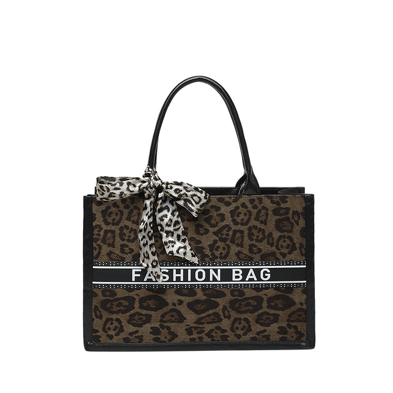 Primavera nueva moda estampado de leopardo de alta capacidad bolso de hombro de estilo extranjero bolso de viaje de nicho para mujeres