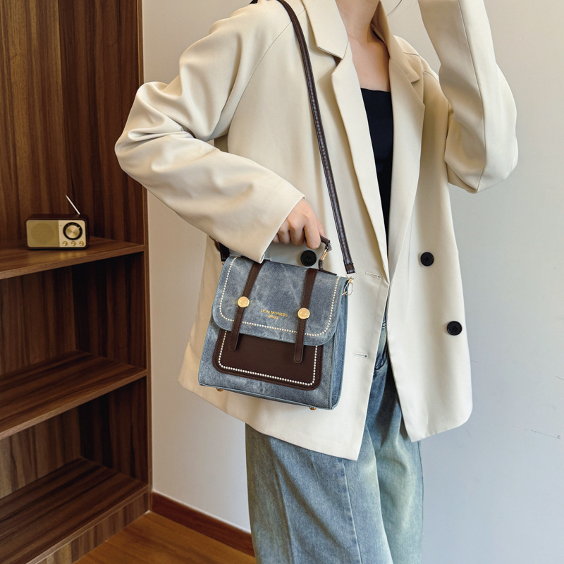 Alta sensación de vaquero pequeño una bolsa de tres mochilas para mujeres 2024 nueva moda mochila de viaje corto