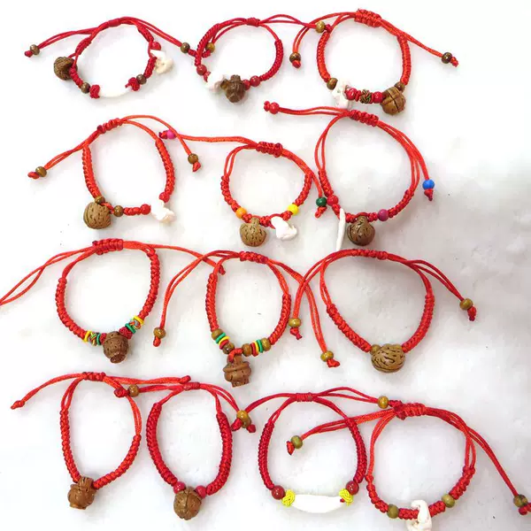 Wholesale High-Quality Peach and Blue Pig Bone Dog Tooth Red Rope Bracelets for Children, Men, and Women