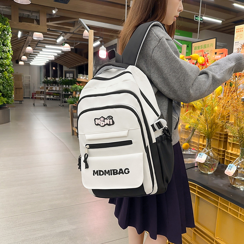 Mochilas escolares niñas de secundaria de alto valor facial nicho estilo insfeng estudiantes de secundaria de gran capacidad chocan con el color de los estudiantes de primaria para reducir la carga mochila