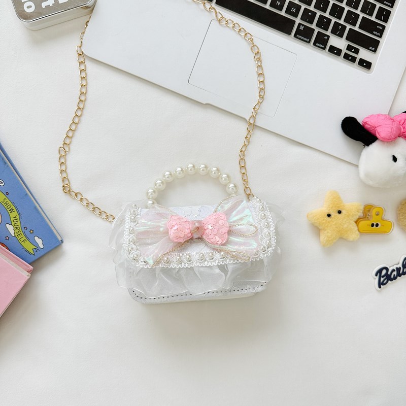 Bolso de perla de fragancia pequeña para niños Bolso de hombro de niña de dibujos animados de moda Bolso de monedero de bebé de todo fósforo con lazo