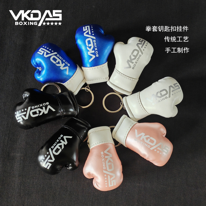 Boxing glove keychain, mini boxing glove, exquisite accessory for bags and car interiors, fighting and combat pendant