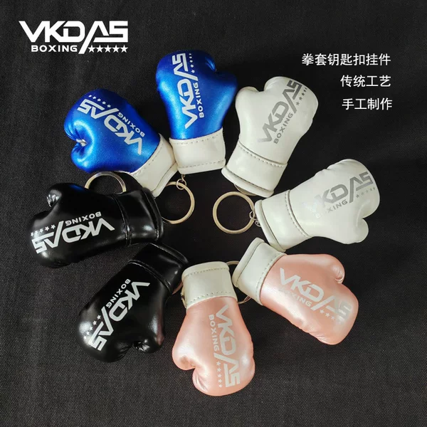 Boxing glove keychain, mini boxing glove, exquisite accessory for bags and car interiors, fighting and combat pendant