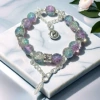 BC01 Yin and Yang Bagua Glass Feather Bracelet