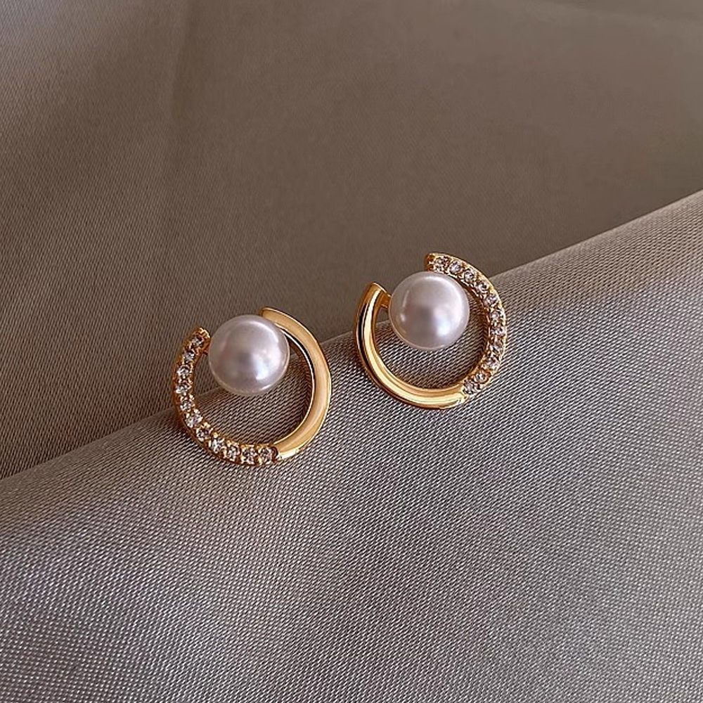 Aguja de plata de moda alta sensación de diamante de goteo de aceite pendientes nicho universal elegante pernos de orejas ligero lujoso temperamento simple orejas para mujeres