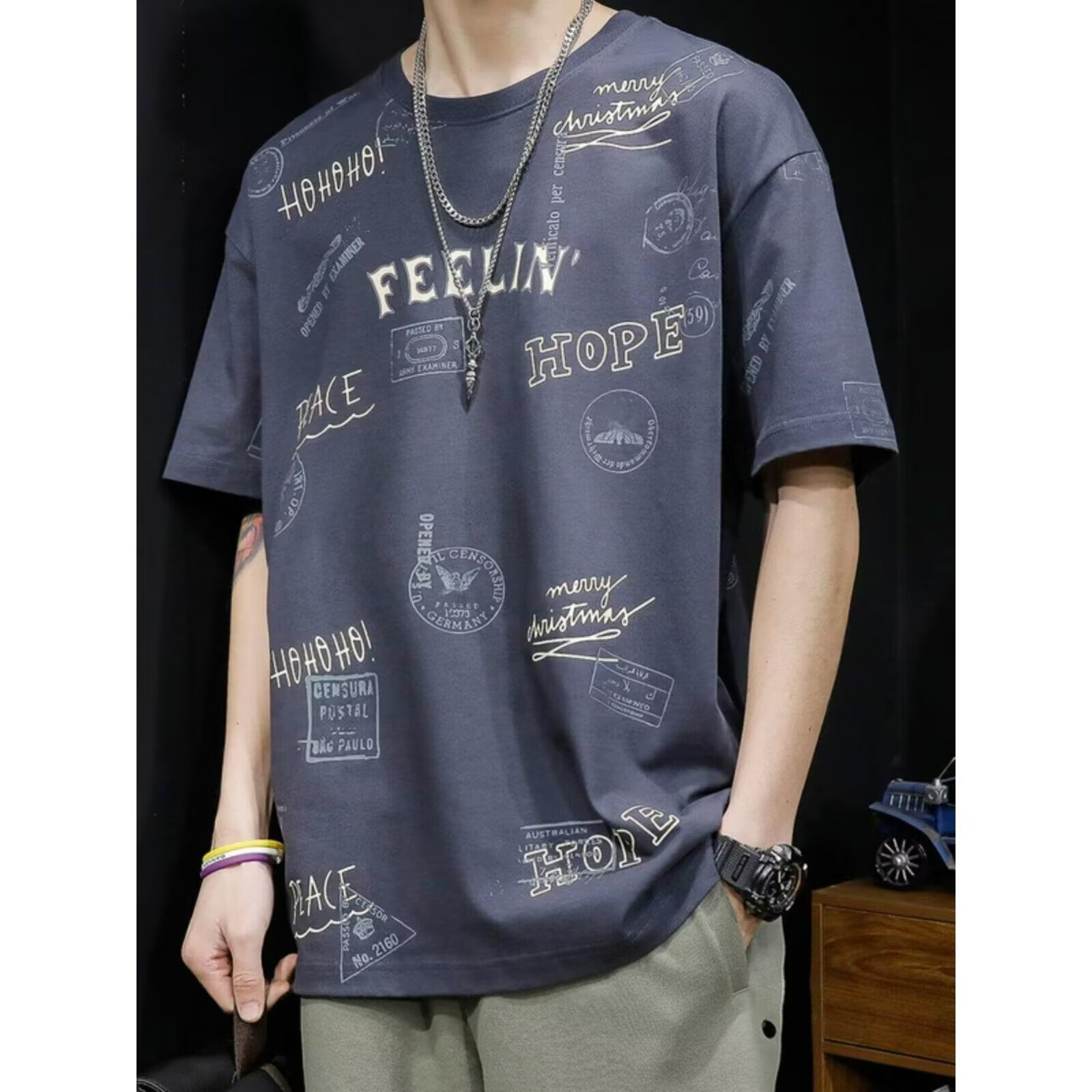 Camiseta de manga corta de verano impresa para hombres nueva marca de moda suelta ins camiseta de media manga retro de verano estudiantes coreanos