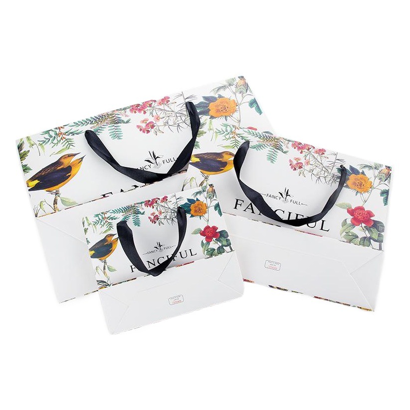 Ropa bolsa de regalo bolso bolsa de papel creativo retro exquisito bolso de compras impreso logo bolsa de regalo