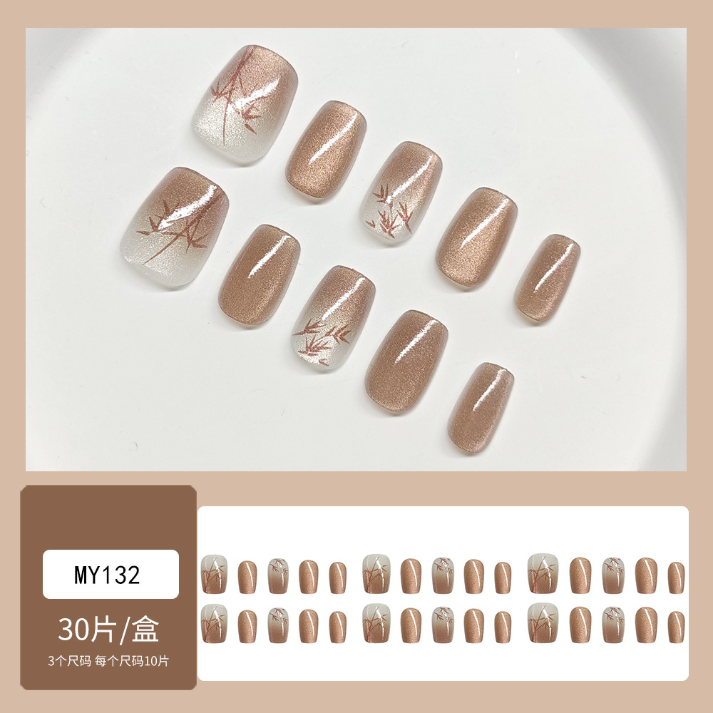 Uñas portátiles de tendencia en TikTok con una sensación de alta gama para el otoño, puro deseo, pegatinas de arte de uñas portátiles con ojo de gato y sonrisa rosa brillante.
