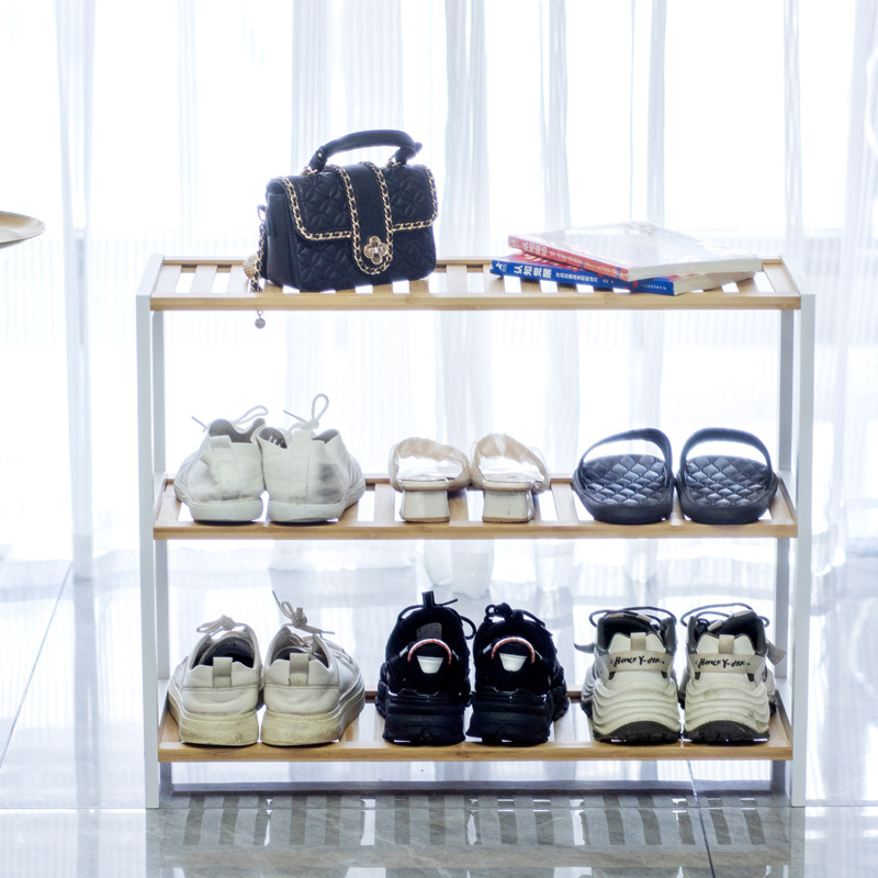 Estante de zapatos simple puerta doméstica interior 2024 explosión nuevo bambú almacenamiento pequeño estrecho en el gabinete de zapatos de madera multicapa