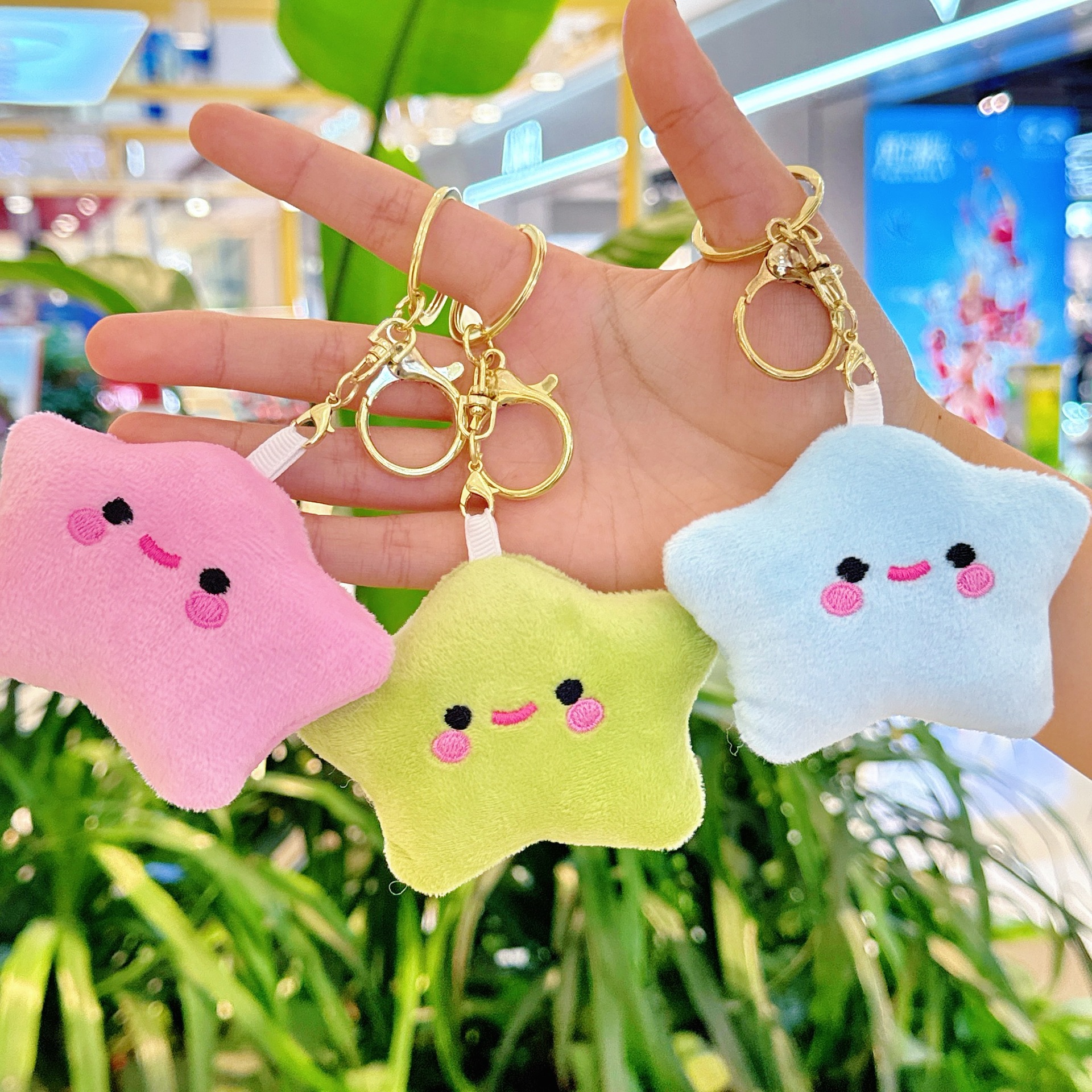 Creativa pequeña estrella llavero de peluche estrella mochila muñeca colgante muñeca juguete al por mayor