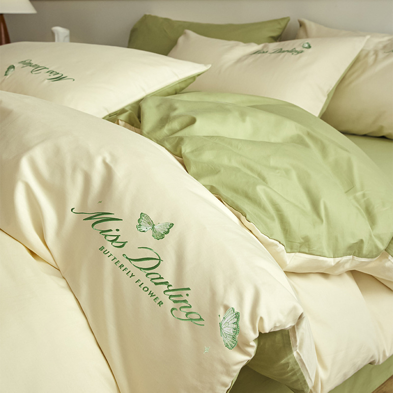 Estilo de lujo ligero 40 piezas de algodón puro traje de cuatro piezas corazón de niña bordado floral funda de edredón ropa de cama de algodón suave de alta calidad