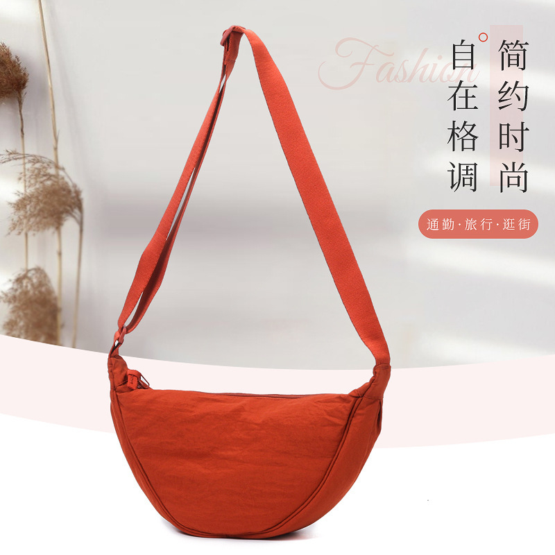 Source Factory Youjia Fitting Room Same Women's Crossbody Bag Little Red Riding Book Nylon Dumpling Bag Student Shoulder Bag Cloth Bag Source Factory Youjia Fitting Room Same Women's Crossbody Bag Little Red Riding Book Nylon Dumpling Bag Student Shoulder Bag Cloth Bag