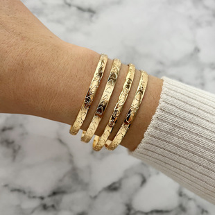 Europe and the United States cross-border tapping pattern love flower pattern exaggerated personality Horus eye opening bracelet 4-piece combination