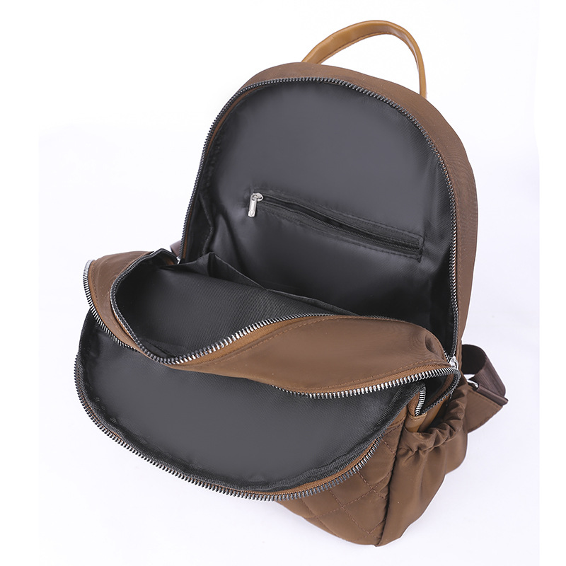 Mochila de nailon para mujer 2022 nueva mochila casual para mujer mochila de viaje de arte simple mochila escolar de moda al por mayor