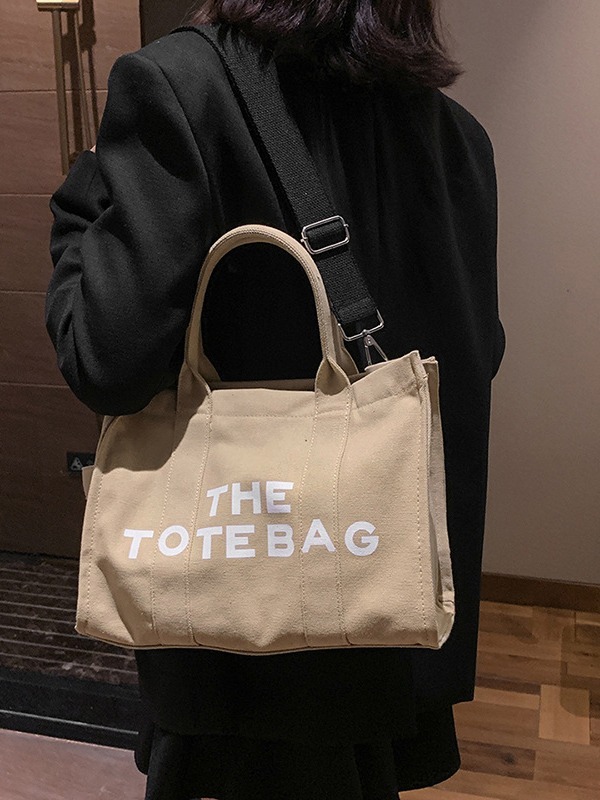 Bolso de mano para mujer, nuevo bolso práctico de lona con nudo transfronterizo, de gran capacidad, adecuado para el trabajo y los desplazamientos, se puede llevar como bolso de hombro o bandolera.