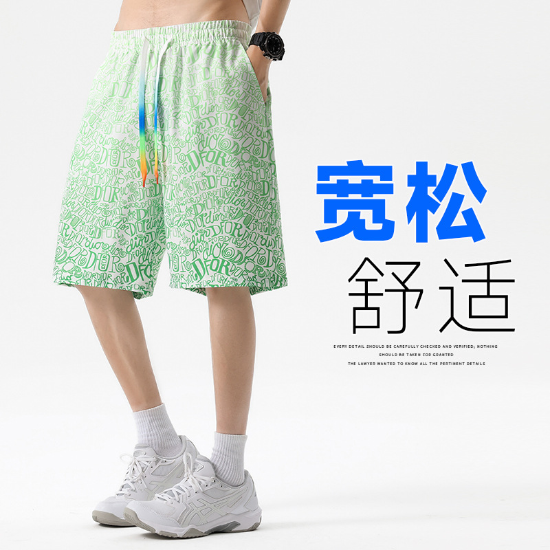 Verano nuevo estilo adolescente pantalones cortos deportivos moda casual gradiente pantalones cortos de camuflaje pantalones sueltos de playa