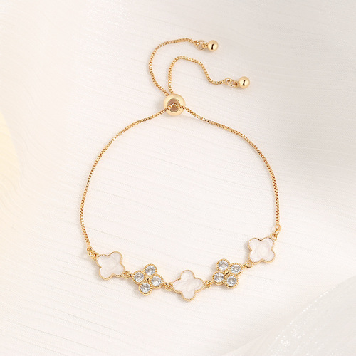 Live broadcast lucky four-leaf clover champagne gold bracelet for women, light luxury fashion imitation mother-of-pearl glue pull-down adjustment bracelet