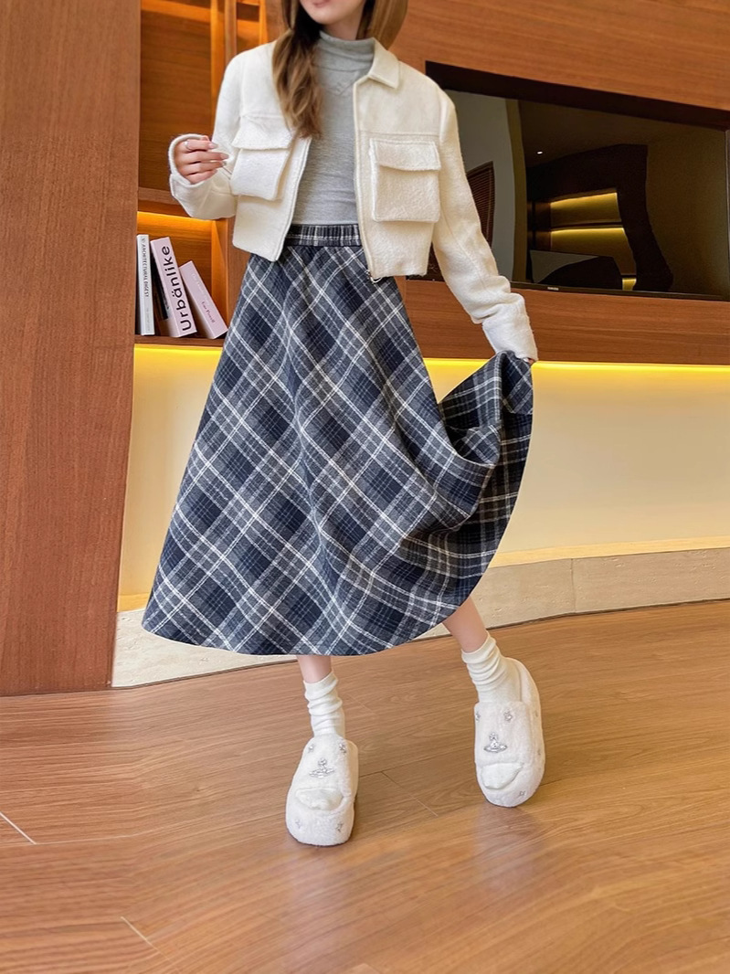 半身のスカートの女性は秋冬にやせています。