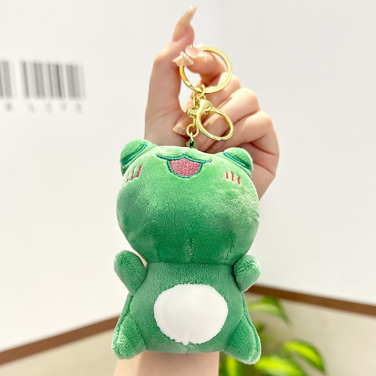 Cuatro pulgadas muñeca máquina colgante felpa llavero lindo muñeca mochila adornos grab máquina muñeca regalo al por mayor