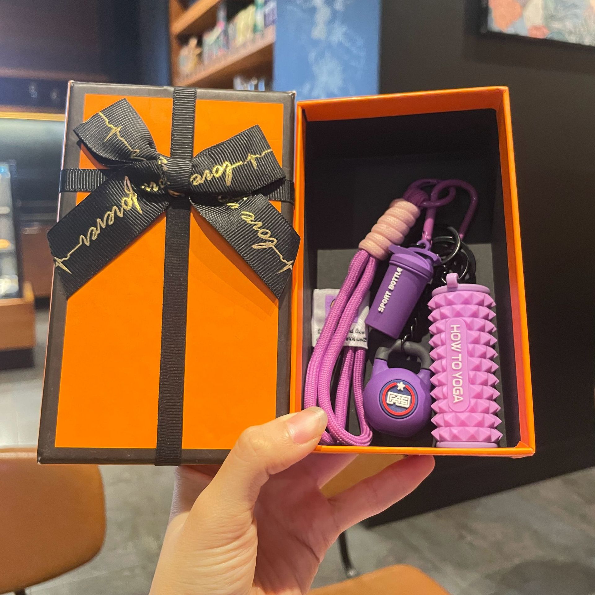 Purple set for yoga from foam, orange gift box