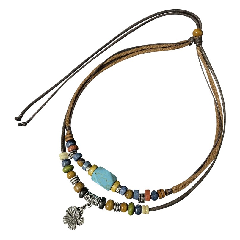 Collar de turquesa para mujer 2024 Verano nuevo estilo étnico retro de múltiples capas Cadena de clavícula de doble capa sentido del diseño del nicho