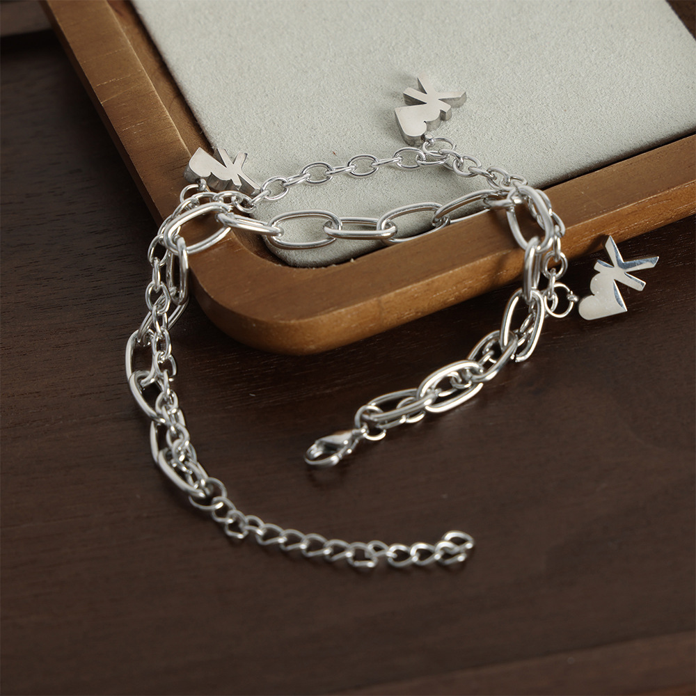 Chino antiguo estilo nicho personalidad Cadena de doble capa cadena apilada estilo diseño amor OK colgante titanio pulsera de acero al por mayor hembra