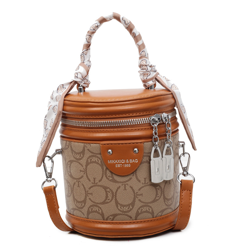 Bolsos de mujer transfronterizos Bolsos de moda Bolsos de cubo de ocio 2025 Bolsos de hombro de nueva tendencia Bolsos de mensajero de textura avanzada