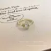 Golden ring with zircon