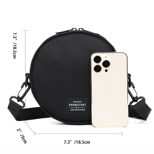 New trendy brand crossbody bag for men—casual, niche-style round single-shoulder bag; chic hand-held small round bag—Japanese-inspired design for women.