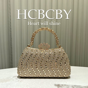 Fashionable elegant golden shiny shoulder bag, small clutch bag
