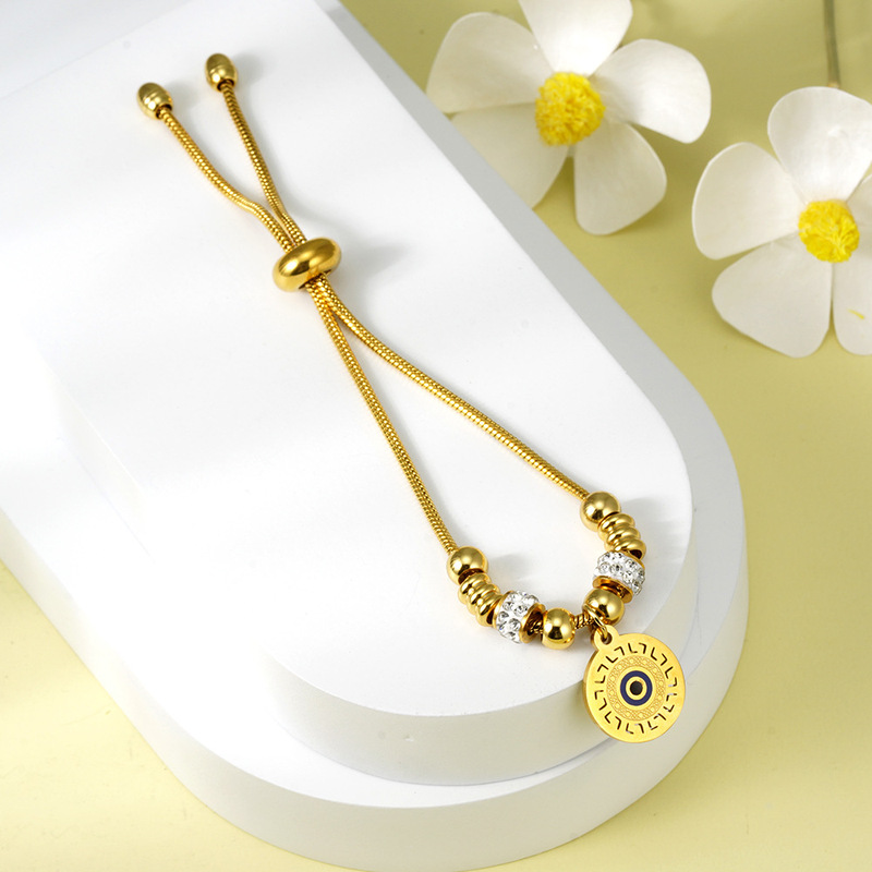 European and American 18K gold diamond-embedded Turkish Devil's Eye titanium steel bracelet female Sun evil eye pull adjustable bracelet