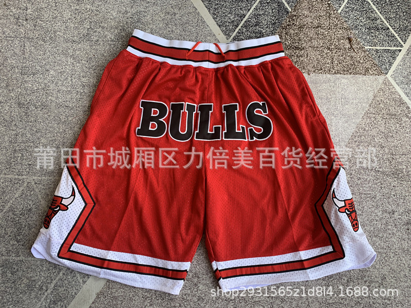 Comercio exterior pantalones de fútbol al por mayor Warriors Lakers 76 caliente Raptor mágico bolsillo bordado pantalones cortos pantalones de baloncesto NFL