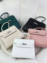 HandbagsŮʿ������r�п�؛Դ���lBags wholesale�������l