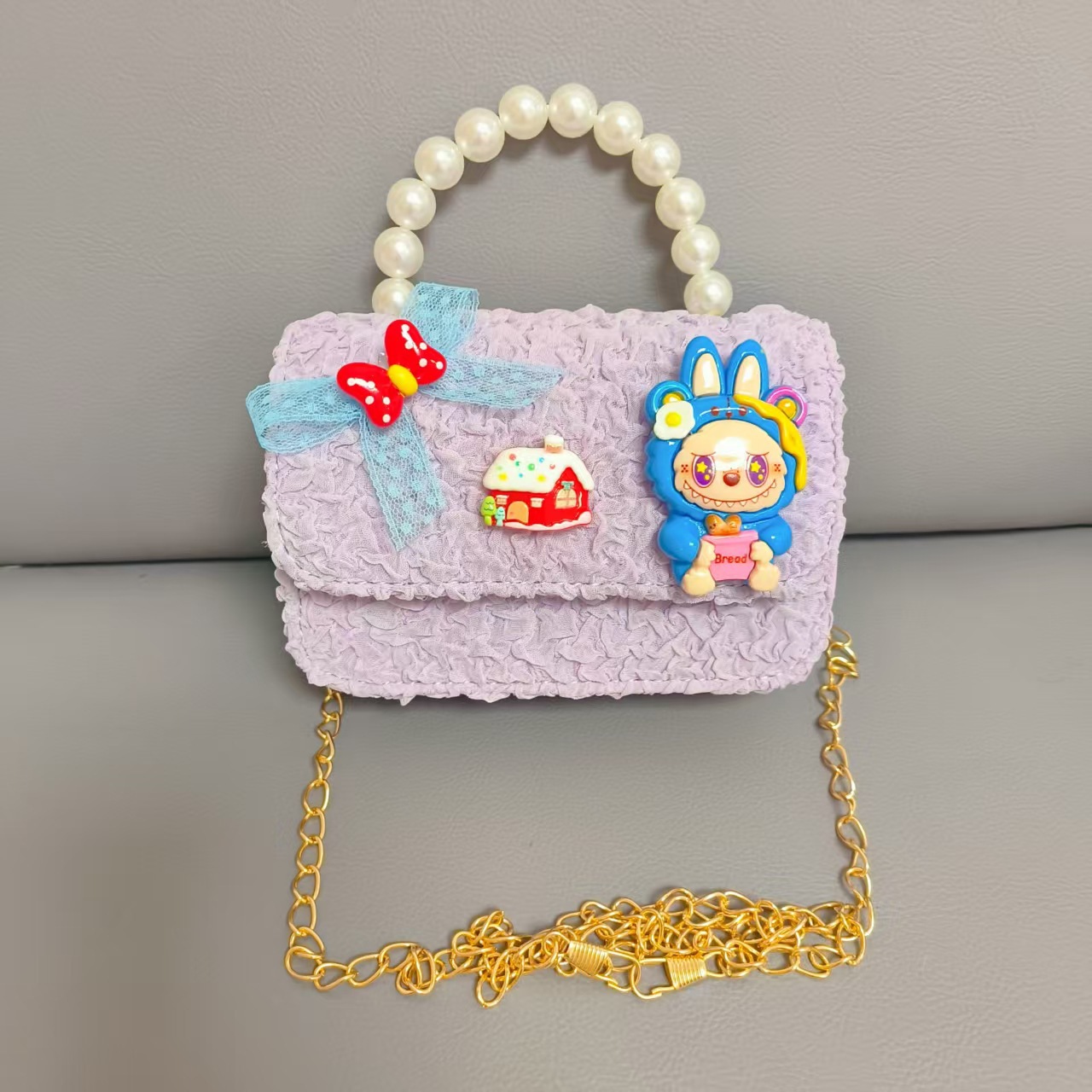 Bolso de perlas de arco de dibujos animados de Año Nuevo de chicas bolso de Año Nuevo de cadenas de viento fragante bolso cuadrado bolso de cambio de niños