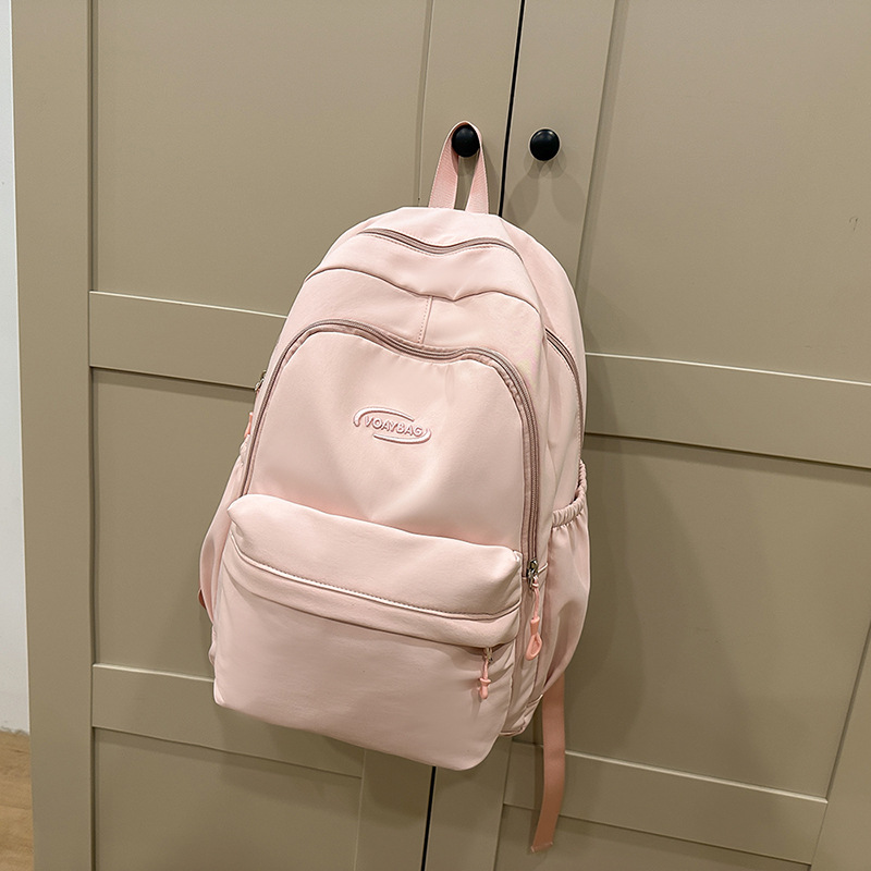 Las chicas japonesas INS son ligeras y sencillas con gran capacidad, y toman mochilas escolares. mochilas de viaje de hombro para estudiantes de secundaria y secundaria.