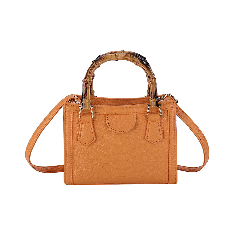 Europa y los Estados Unidos retro bolsos transfronterizos mujeres 2024 nueva moda simple bolsos de mano casuales cocodrilo mochila pequeña