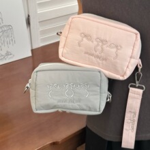 韩系简约CCD收纳包防摔加厚相机包便携女刺绣蝴蝶结手腕包收纳袋