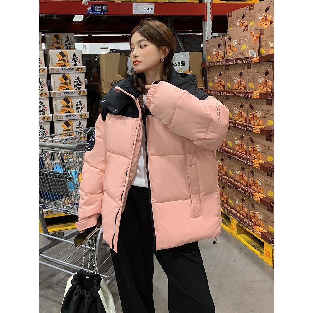 Comercio exterior invierno de 2025 nueva ropa de algodón de color grueso con sombrero de mujer ropa de algodón suelta ropa de pan chaqueta de algodón