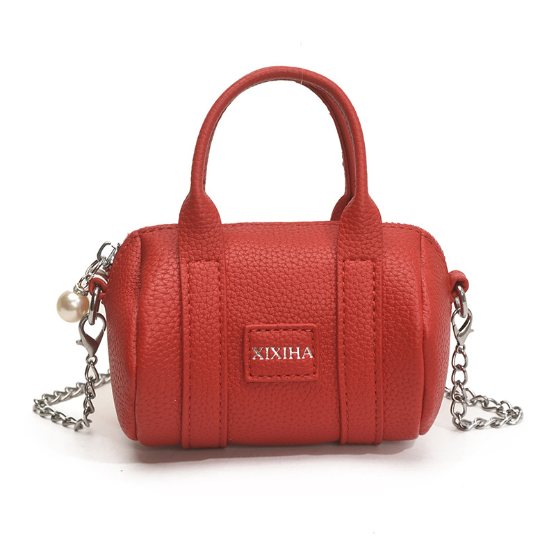 Coreano simple color sólido bolso de hombro para niños y niñas letras de aire extranjero mini bolso de bebé nuevo bolso de almohada para niños
