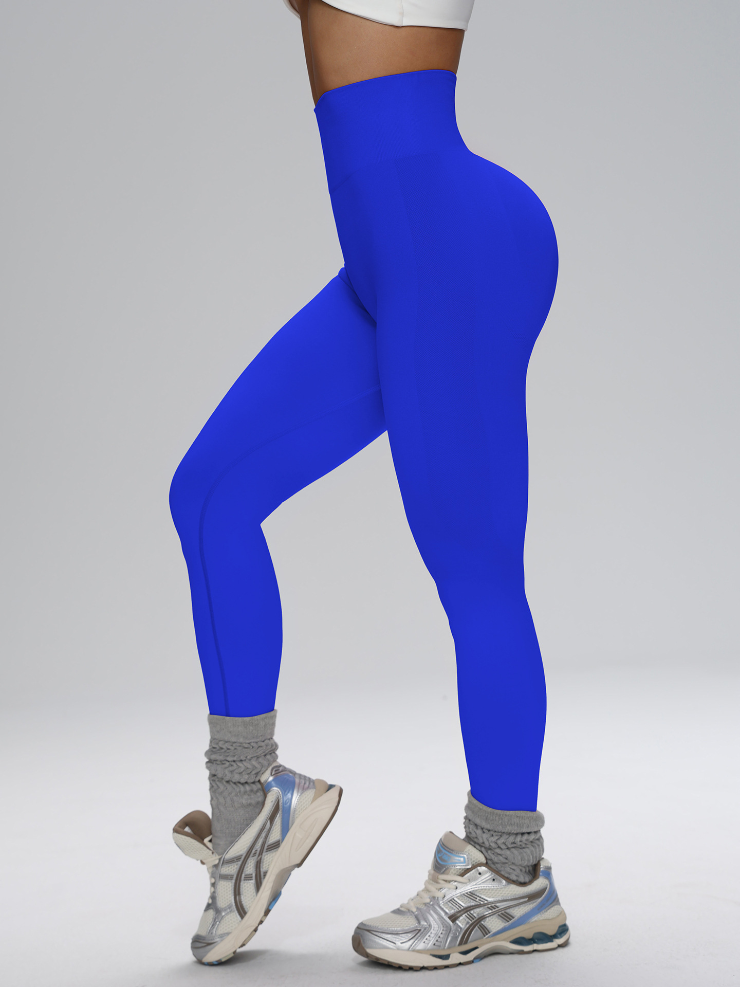 Europa y los Estados Unidos sin costuras cintura alta pantalon de gimnasio de alta cadera para mujeres corriendo al aire libre apertado nueve pantalones de pelusa de miel