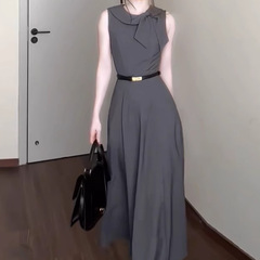フランスのハイエンドヘボンスタイルのレトロなノースリーブドレス女性のための 2025 夏の新しいウエスト痩身ロングスカート
