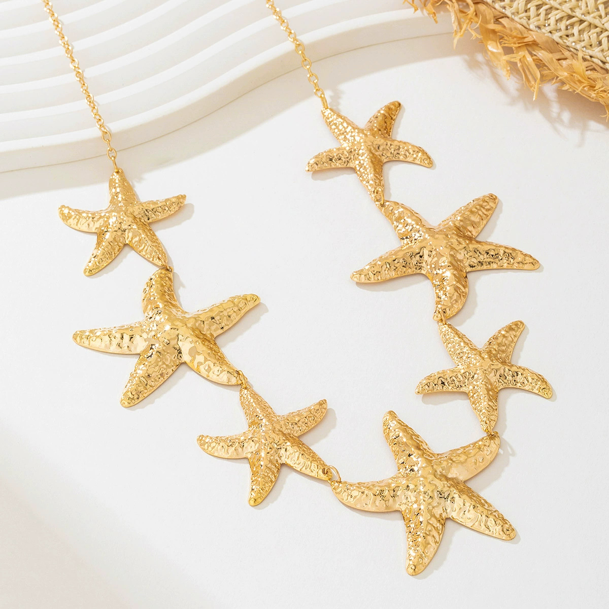Moda europea y americana, retro transfronterizo, elegante serie oceánica, serie de metal, colgante de estrella de mar, cadena de cintura para mujer