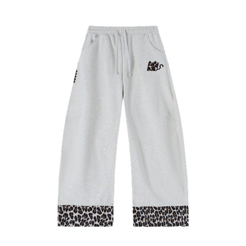 Pantalones casuales para hombres primavera y otoño de 2025 pantalones sueltos de piernas anchas de leopardo para hombres pantalones deportivos de tendencia para hombres