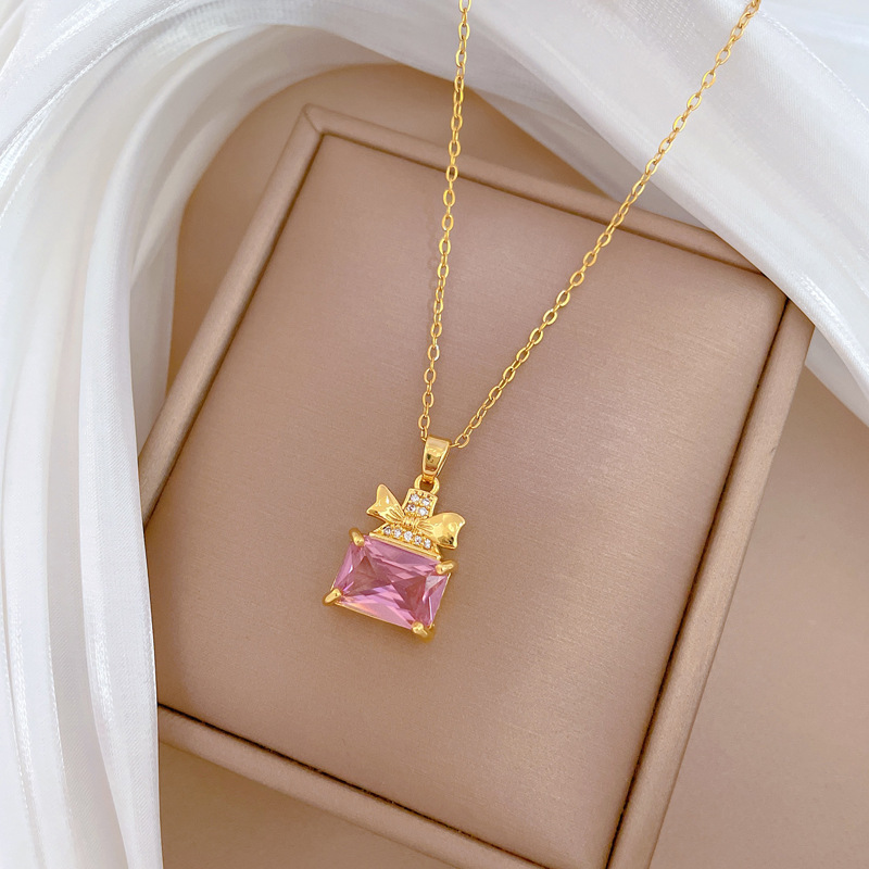 Set collana e orecchini a farfalla con boccetta di profumo_voghion.com