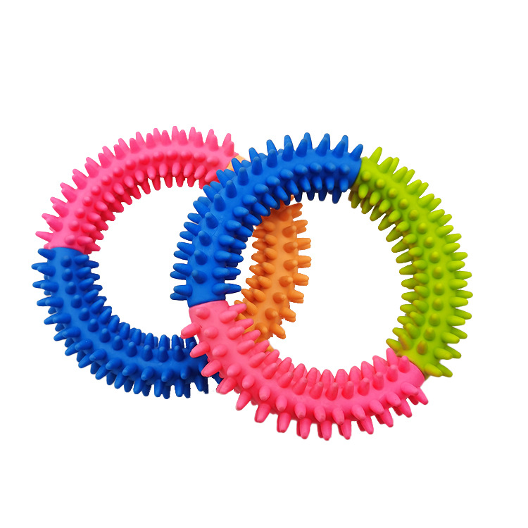 Ventas directas de fábrica nuevo TPR dientes molienda círculo color púas pegamento suave mordedura resistente perro juguete suministros para mascotas