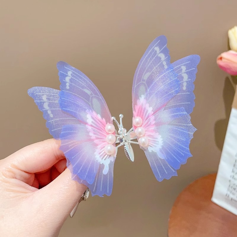 Clip de cabello de mariposa móvil ultra inmortal electrónica azul tulle perla clip de boca de pato decoración accesorios de playa clip tocado