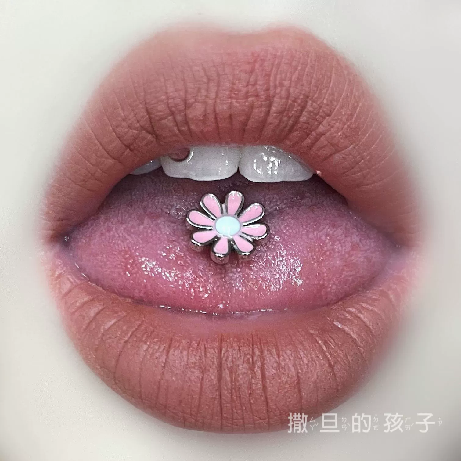 Tongue piercing stainless steel, flowered