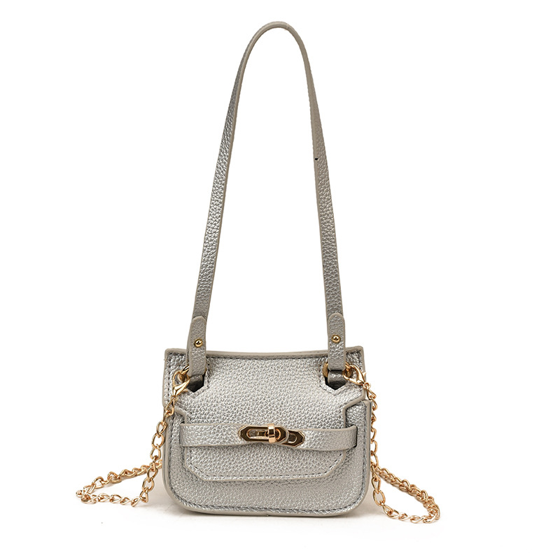 Nuevo bolso de cambio infantil coreano de moda de color sólido mini mochila de bebé comercio exterior accesorios de cadena bolsa de moda
